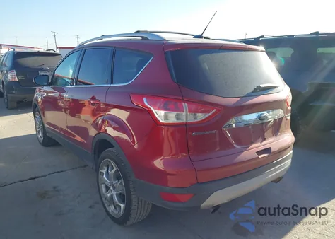 2014 Ford Escape Titanium z USA, uszkodzony, nr VIN 1FMCU9J91EUC56419